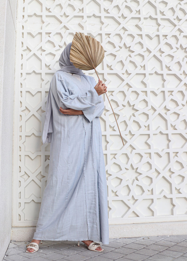 Basic 04 Four Pale Blue Stripped Linen Abaya look 1 by BASIC ABAYA DUBAI