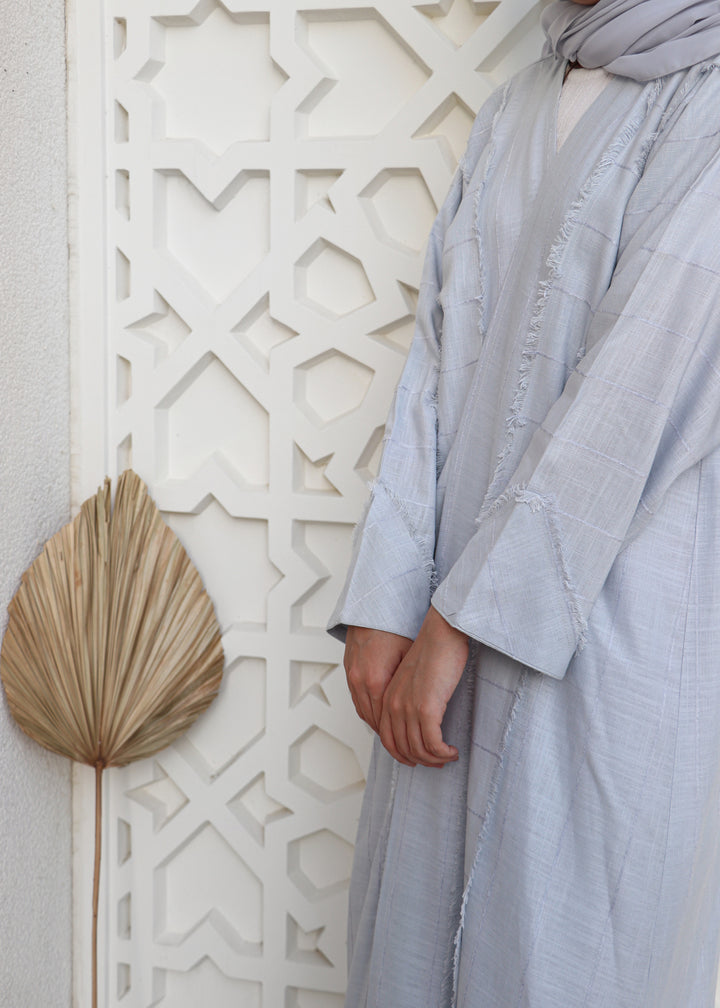 Basic 04 Four Pale Blue Stripped Linen Abaya look 3 by BASIC ABAYA DUBAI