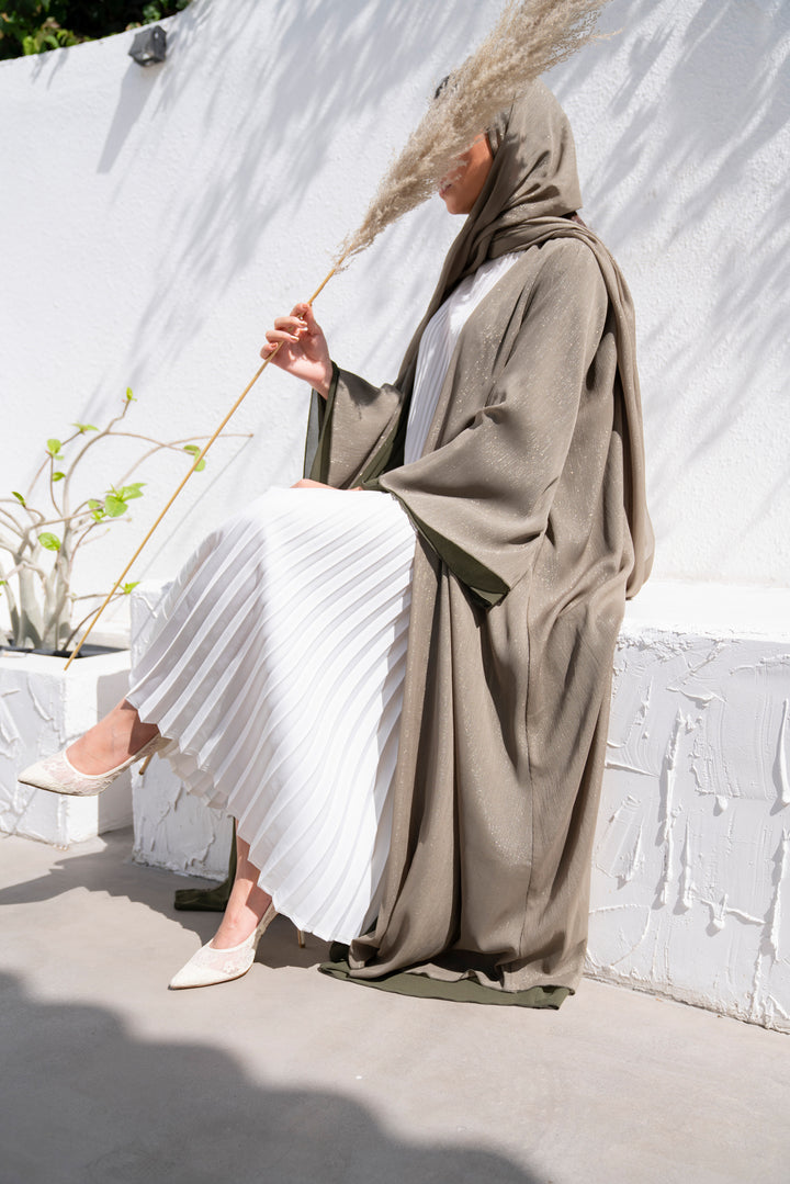 Basic 10 Ten Green Abaya look 3 from the LATEST ONLINE DUBAI ABAYAS COLLECTION